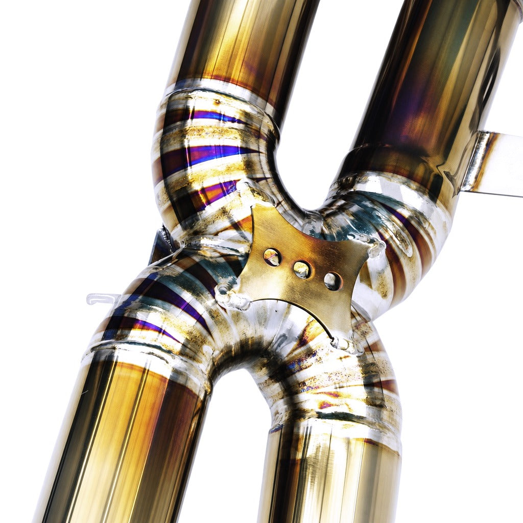 WSTN Performance Porsche 718 GT4 RS 982 9A2 4.0 titanium midpipe — top-down view showing weld seams