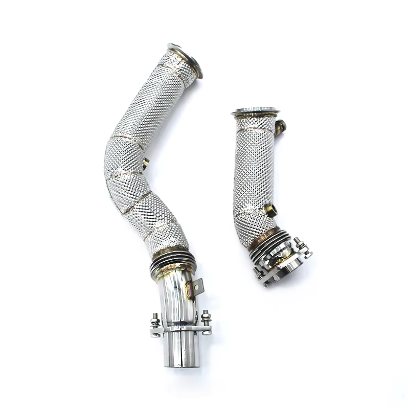 Metallic exhaust pipes with mesh design on a white background
